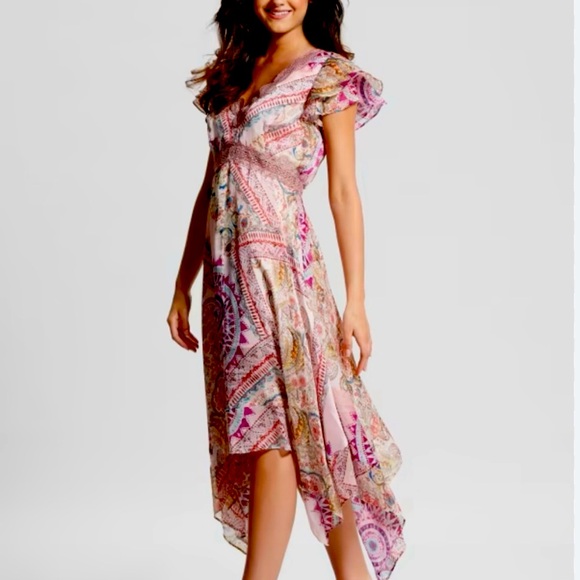 Beautiful asymmetrical dress with fluttery cap sleeves and crochet details. Sz S - Picture 2 of 3